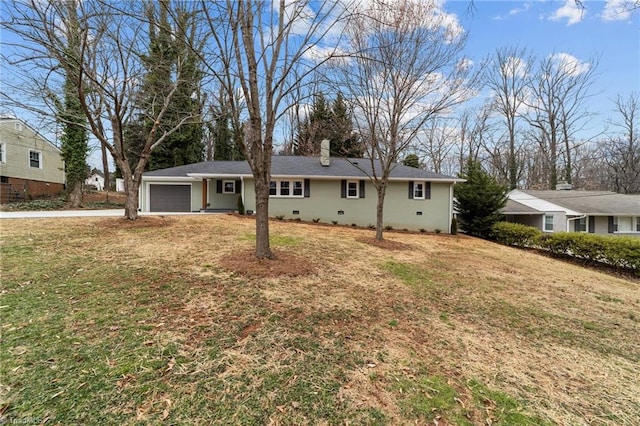 view of front facade featuring crawl space, a garage, a chimney, and a front lawn