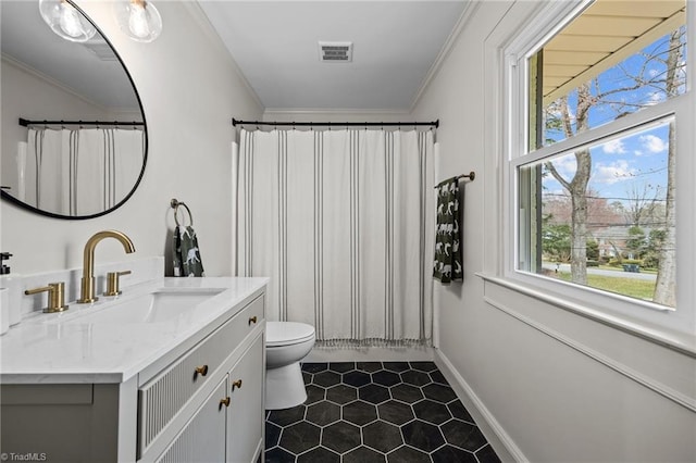 full bathroom with tile patterned flooring, visible vents, toilet, ornamental molding, and vanity