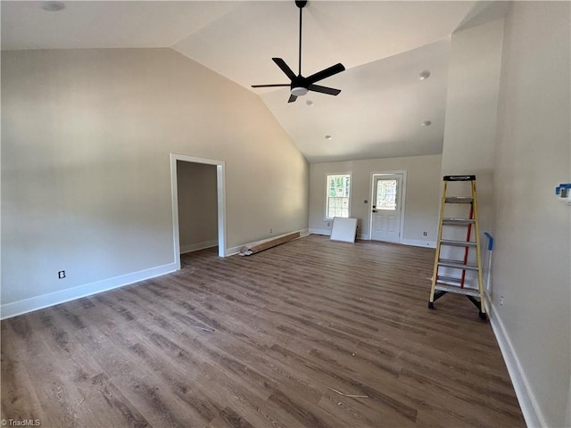 1017 Virginia St, Thomasville, NC 27360 - unfurnished living room featuring a ceiling fan, high vaulted ceiling, and wood finished floors