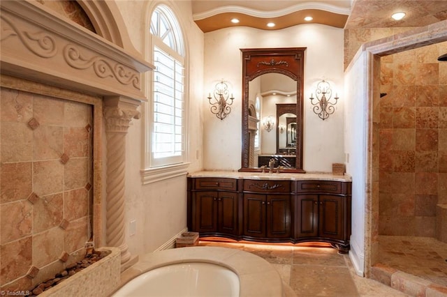 bathroom with vanity and independent shower and bath