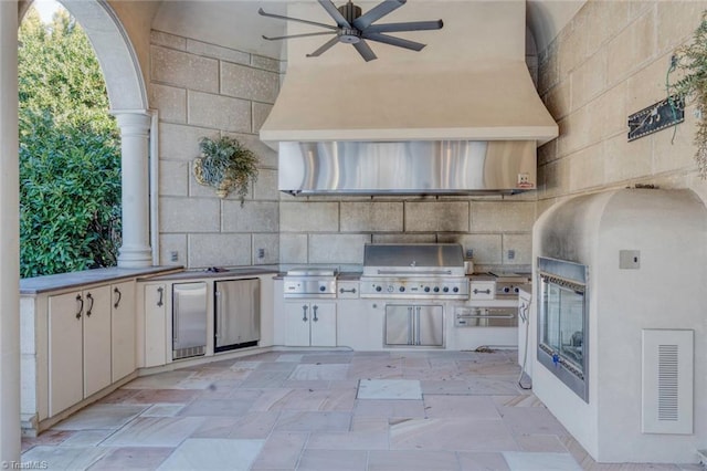 view of patio / terrace with a grill and exterior kitchen