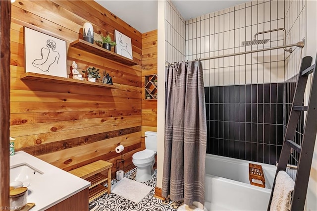 full bathroom featuring shower / bath combo, tile patterned flooring, wooden walls, and toilet