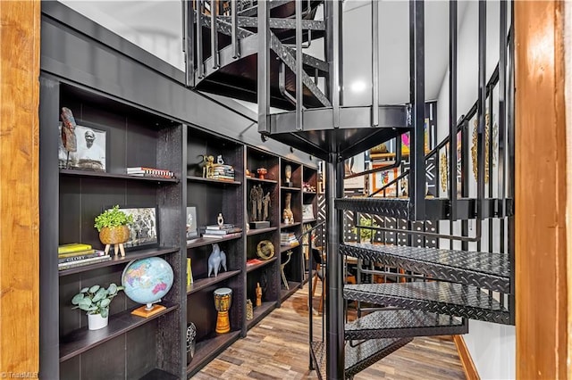 wine area with hardwood / wood-style flooring