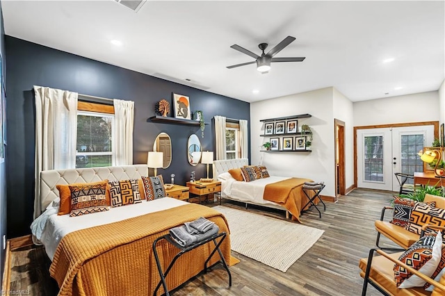 bedroom with hardwood / wood-style flooring, access to outside, french doors, and ceiling fan