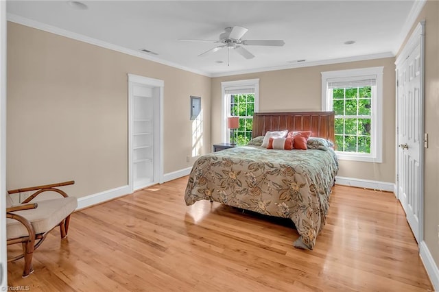 338 Fairfield Ct, Mount Gilead, NC 27306 - bedroom featuring light wood finished floors, baseboards, and crown molding