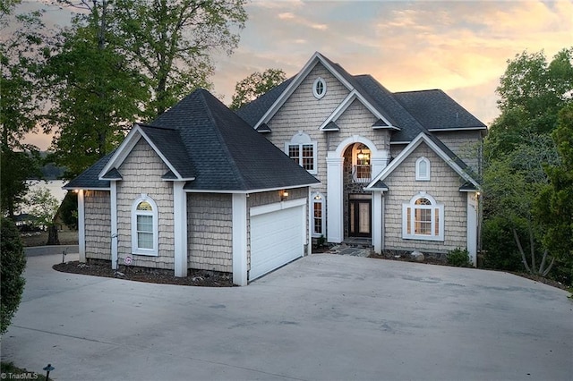338 Fairfield Ct, Mount Gilead, NC 27306 - view of front of property featuring driveway, a garage, and a shingled roof
