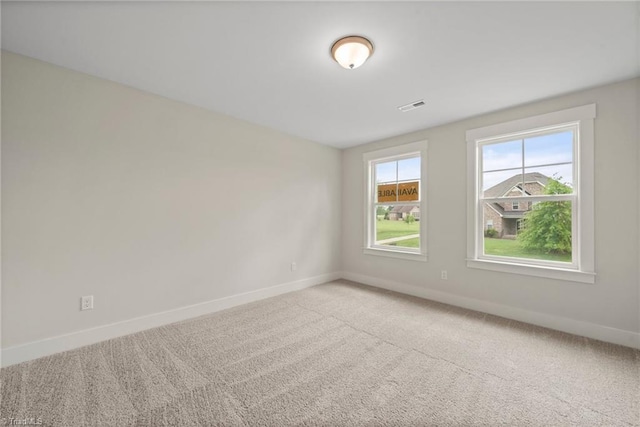 view of carpeted spare room