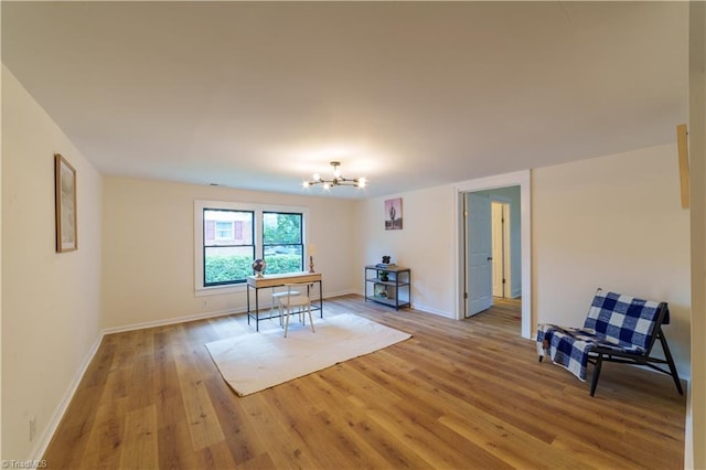 301 S Shaver St, Salisbury, NC 28144 - dining room featuring light wood finished floors and a chandelier