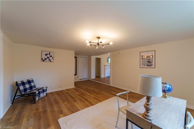 301 S Shaver St, Salisbury, NC 28144 - living area featuring wood finished floors and a chandelier