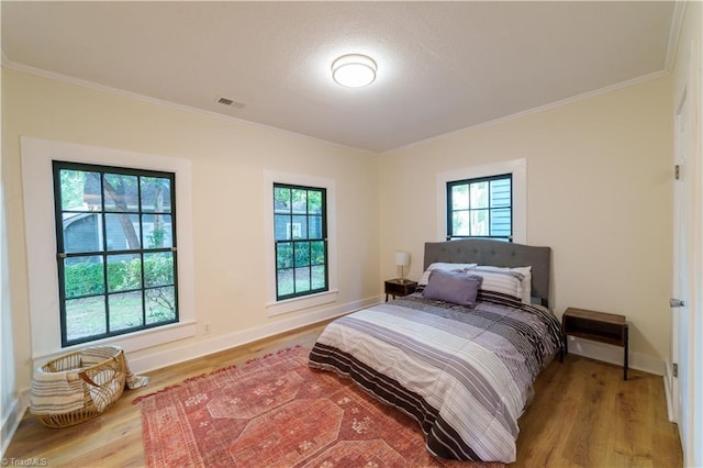 301 S Shaver St, Salisbury, NC 28144 - bedroom with crown molding and wood finished floors