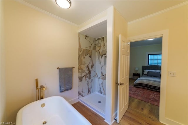 301 S Shaver St, Salisbury, NC 28144 - ensuite bathroom featuring wood finished floors, ornamental molding, a freestanding tub, and a marble finish shower