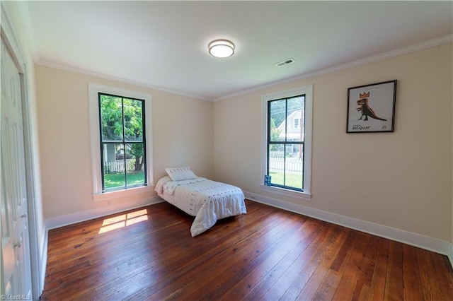 301 S Shaver St, Salisbury, NC 28144 - bedroom featuring crown molding and hardwood / wood-style floors