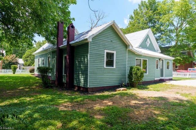 301 S Shaver St, Salisbury, NC 28144 - view of side of property with a chimney and a metal roof