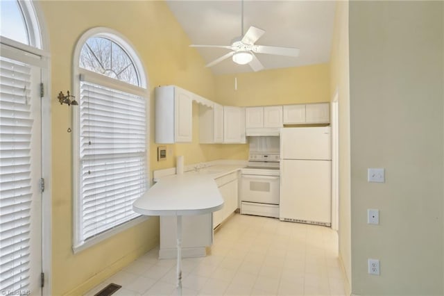 1146 Rogers Rd, Graham, NC 27253 - kitchen featuring white appliances, a ceiling fan, a sink, a peninsula, and light countertops