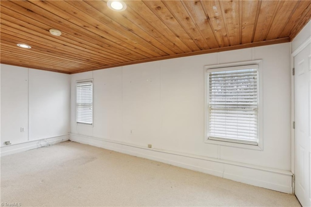 1146 Rogers Rd, Graham, NC 27253 - unfurnished room featuring wood ceiling, light carpet, healthy amount of natural light, ornamental molding, and recessed lighting