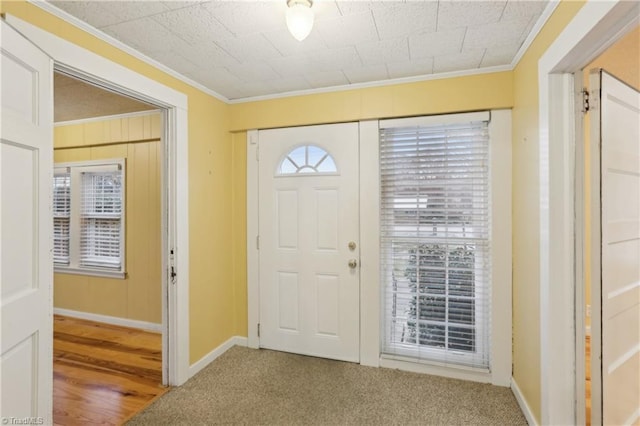 1146 Rogers Rd, Graham, NC 27253 - foyer entrance featuring crown molding, baseboards, and carpet