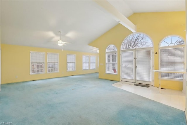 1146 Rogers Rd, Graham, NC 27253 - unfurnished living room with a ceiling fan, carpet floors, high vaulted ceiling, and beam ceiling