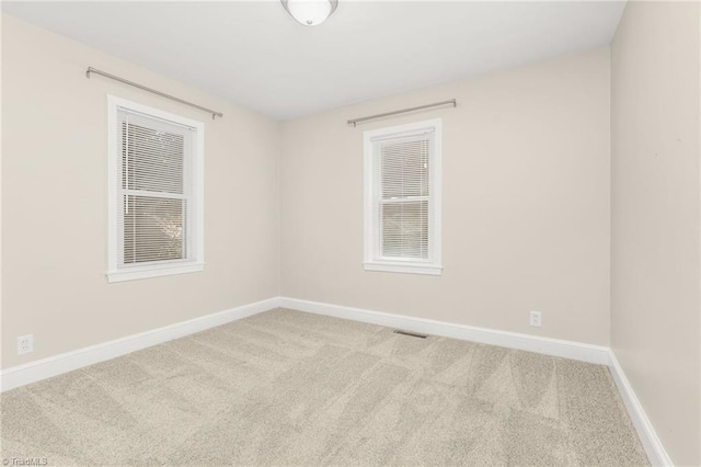 225 Harper St, Winston-Salem, NC 27104 - carpeted empty room featuring baseboards