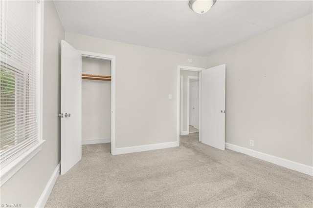 225 Harper St, Winston-Salem, NC 27104 - unfurnished bedroom featuring carpet flooring and a closet