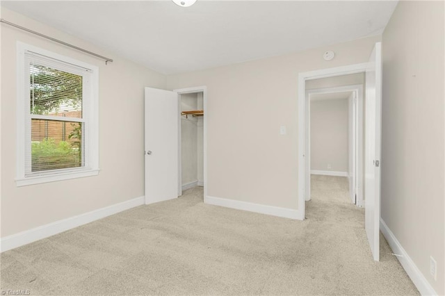 225 Harper St, Winston-Salem, NC 27104 - unfurnished bedroom featuring light colored carpet and a closet
