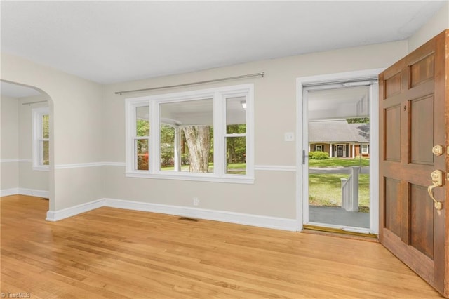 225 Harper St, Winston-Salem, NC 27104 - foyer featuring light wood finished floors and arched walkways