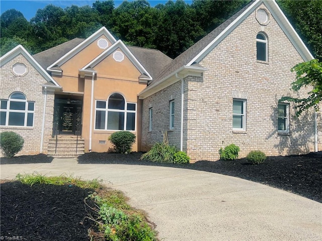 590 Turner Mountain Rd, Mount Airy, NC 27030 - view of front of property featuring brick siding and roof with shingles