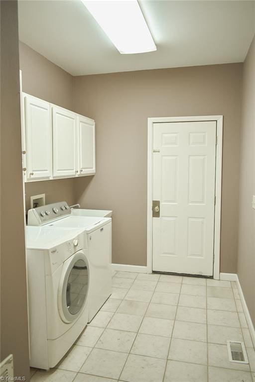 590 Turner Mountain Rd, Mount Airy, NC 27030 - laundry room featuring cabinet space and washer and clothes dryer