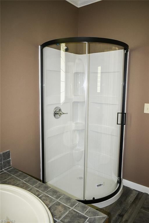 590 Turner Mountain Rd, Mount Airy, NC 27030 - full bathroom featuring a stall shower and wood finished floors