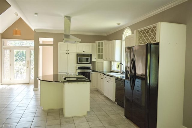 590 Turner Mountain Rd, Mount Airy, NC 27030 - kitchen with black appliances, dark countertops, light tile patterned floors, glass insert cabinets, and crown molding
