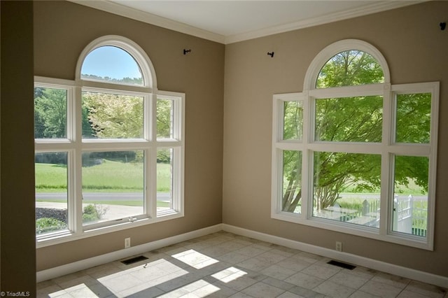590 Turner Mountain Rd, Mount Airy, NC 27030 - unfurnished room with plenty of natural light, light tile patterned floors, and ornamental molding