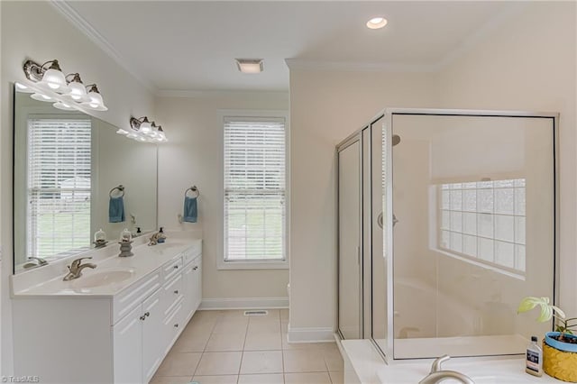 160 Serenity Pointe Dr, Kernersville, NC 27284 - bathroom with double vanity, a stall shower, a garden tub, tile patterned flooring, and crown molding