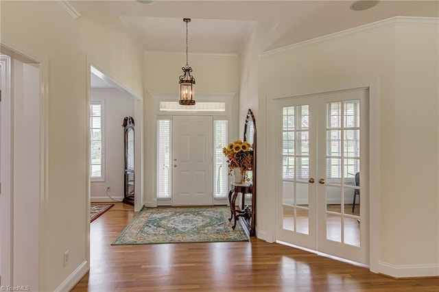 160 Serenity Pointe Dr, Kernersville, NC 27284 - foyer featuring french doors, wood finished floors, and ornamental molding