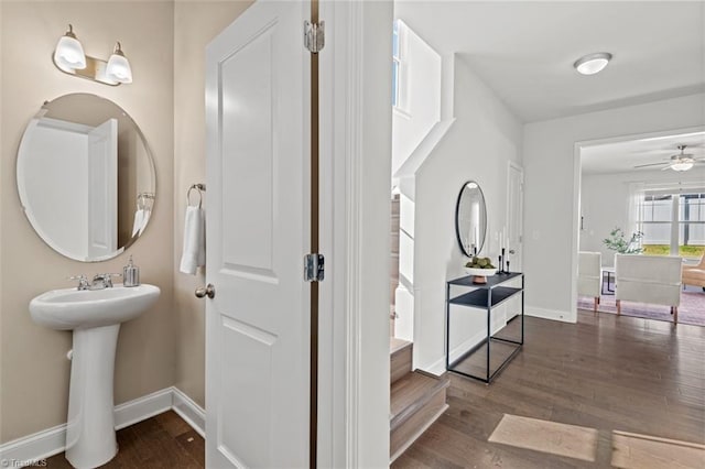 bathroom with hardwood / wood-style floors, ceiling fan, and sink