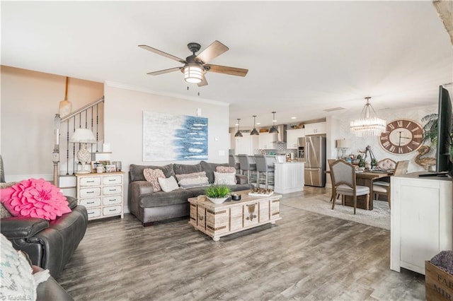 440 Sportsman Dr, Salisbury, NC 28146 - living room with wood finished floors, ceiling fan with notable chandelier, and crown molding