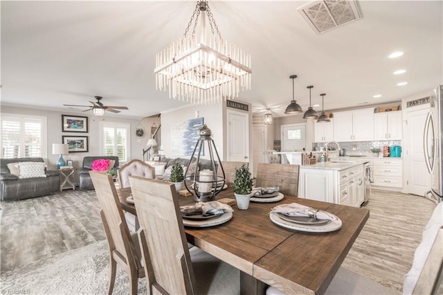 440 Sportsman Dr, Salisbury, NC 28146 - dining area with visible vents, a ceiling fan, light wood-style flooring, and recessed lighting