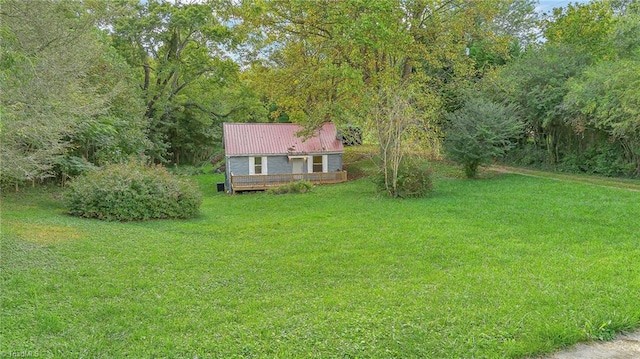 view of yard featuring a wooden deck