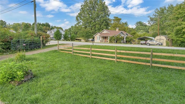 view of yard with a carport