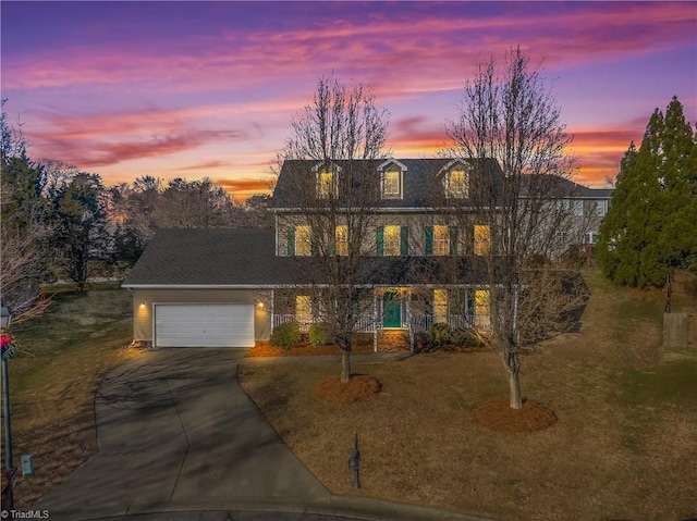 colonial inspired home with a garage