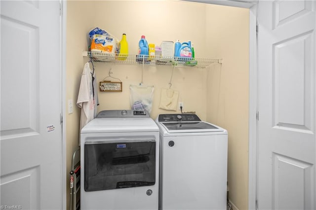 laundry area with washer and clothes dryer