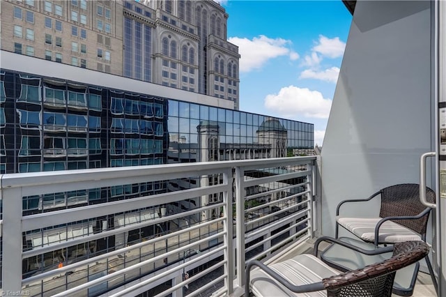 balcony featuring a city view