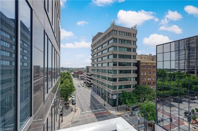 view of property with a city view