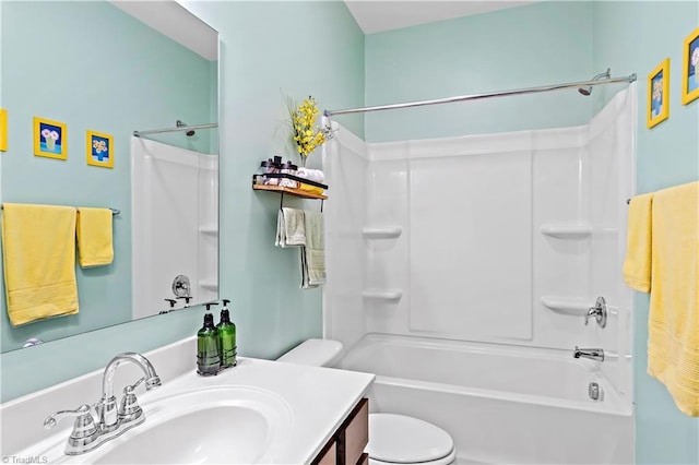 full bathroom with vanity, shower / tub combination, and toilet