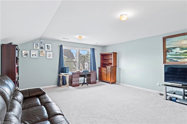 carpeted living room with lofted ceiling