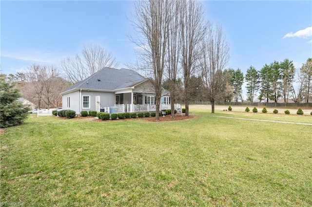 view of yard featuring fence