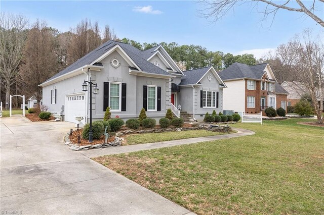 view of front of property featuring a shingled roof, concrete driveway, a front yard, stucco siding, and a garage