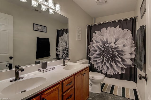 full bathroom featuring toilet, shower / bathtub combination with curtain, and vanity