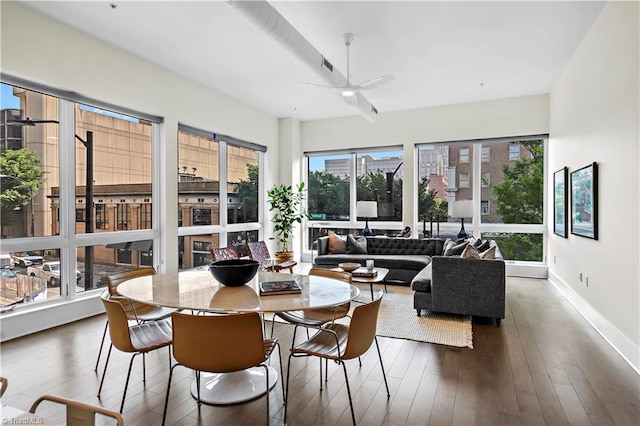 400 W 4th St Unit 305, Winston-Salem, NC 27101 - sunroom / solarium featuring healthy amount of natural light, hardwood / wood-style floors, and baseboards
