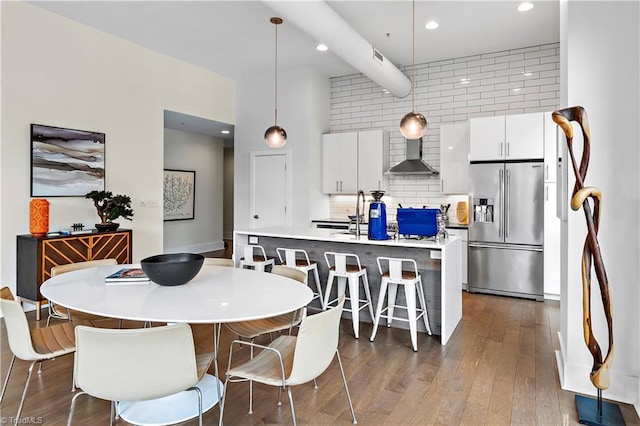 400 W 4th St Unit 305, Winston-Salem, NC 27101 - dining area featuring dark wood-style flooring and recessed lighting