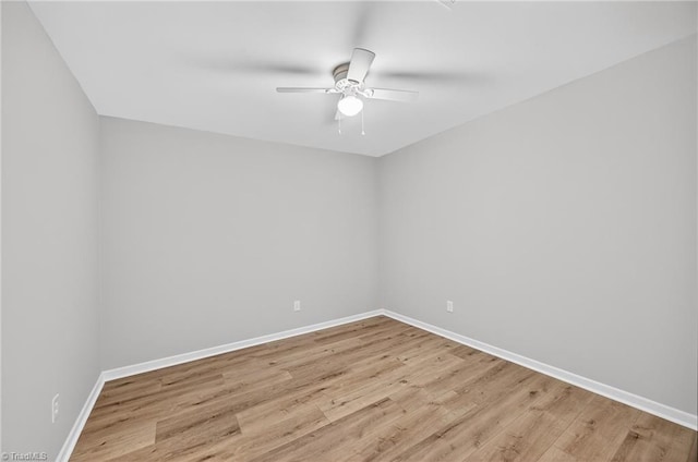 1814 Guyer St Unit A, High Point, NC 27265 - unfurnished room featuring baseboards, a ceiling fan, and light wood-style floors
