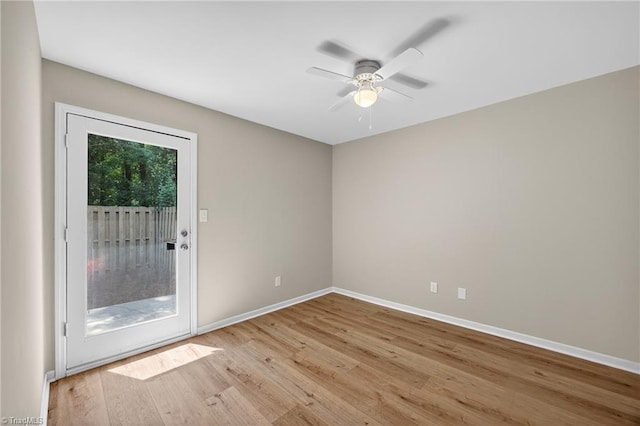 1814 Guyer St Unit A, High Point, NC 27265 - spare room with wood finished floors, ceiling fan, and baseboards